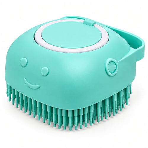 A mint green silicone baby hairbrush with a smiling face design, flexible bristles, and a white circular accent on the lid, shown on a solid white background.
