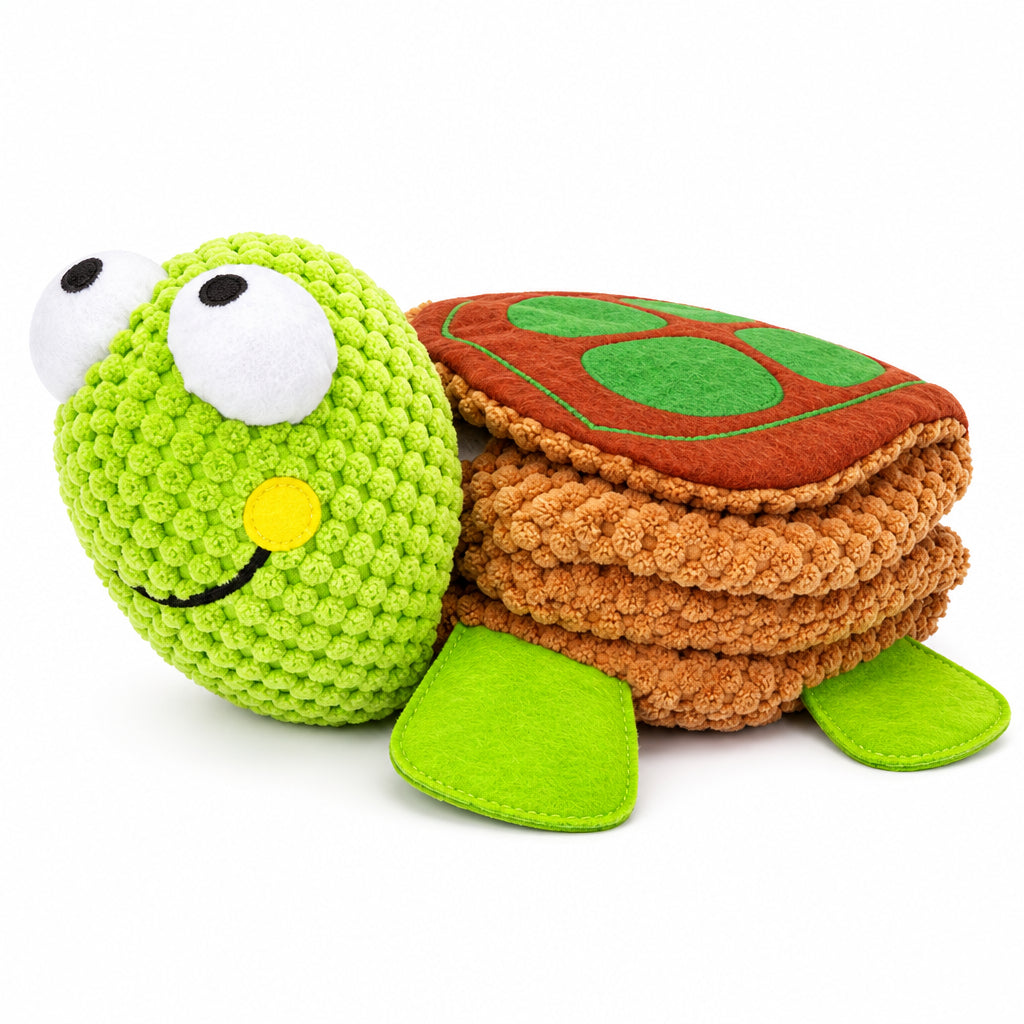 Dog toy shaped like a turtle with a dog interacting with it on a white background